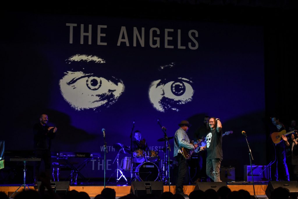 John Brewster and Dave Gleeson from 'The Angels' performing on stage at Battle of the Bands with St Peter's College staff members