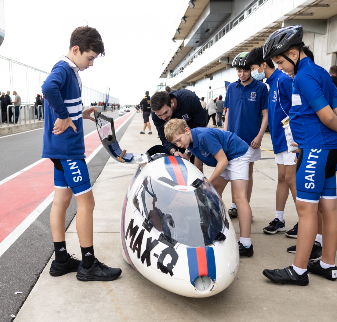Students preparing ahead of a pedal prix race