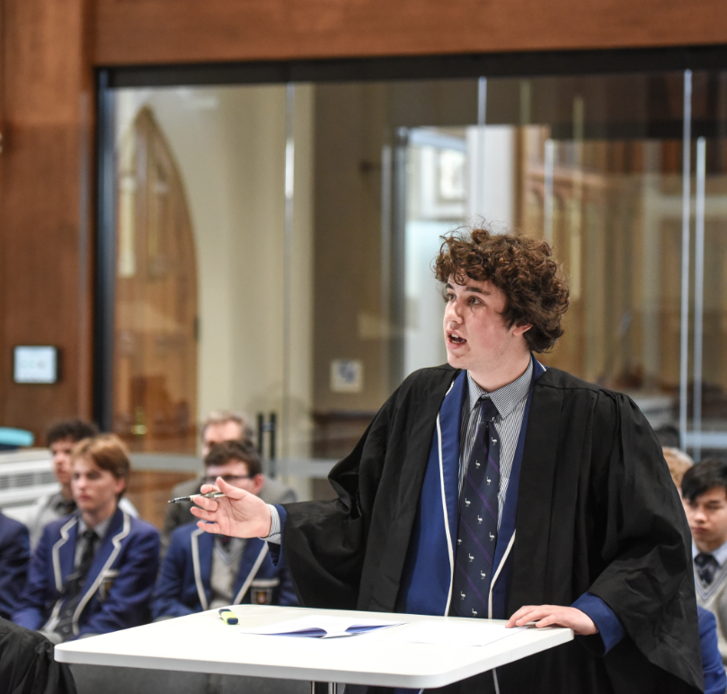 Student performing in a mock trial as part of an assessment