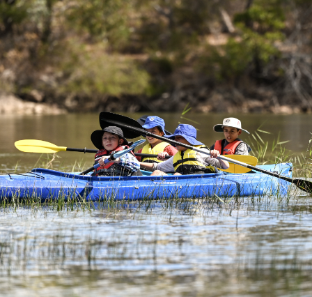 Students kayaking onna school camp