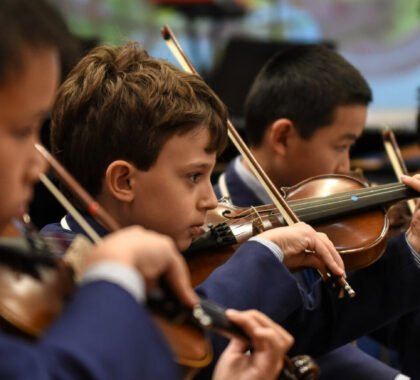 Students playing the violin